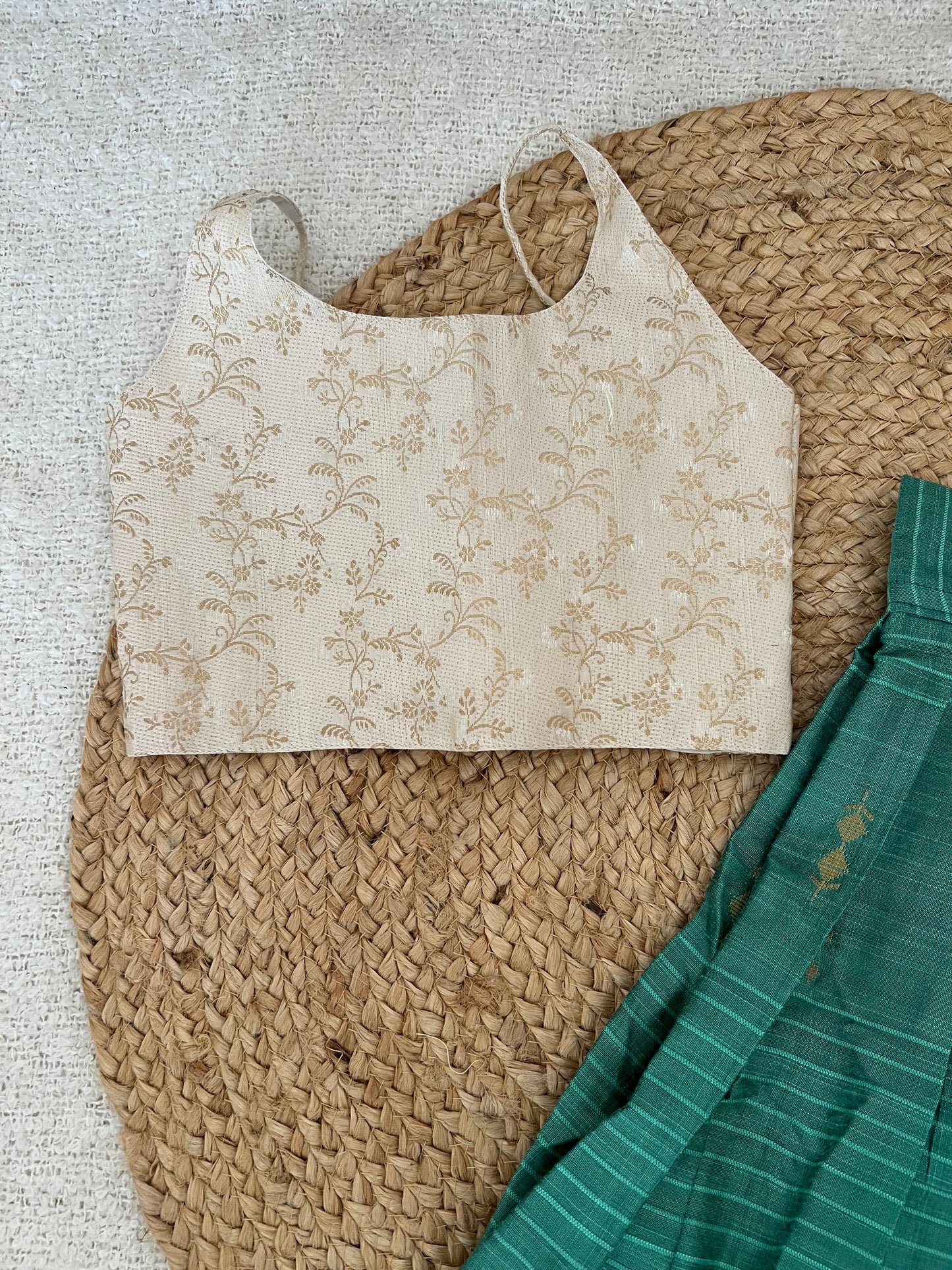 White top and green skirt