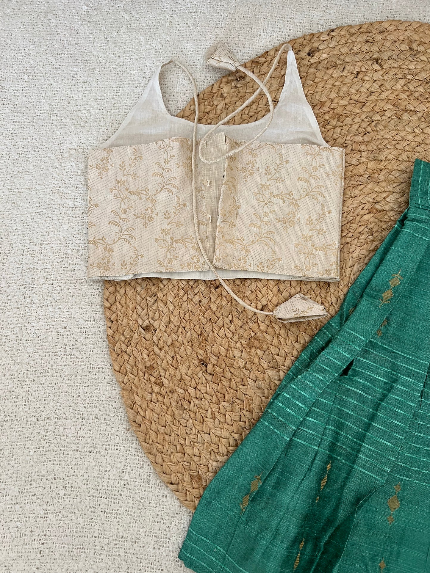 White top and green skirt