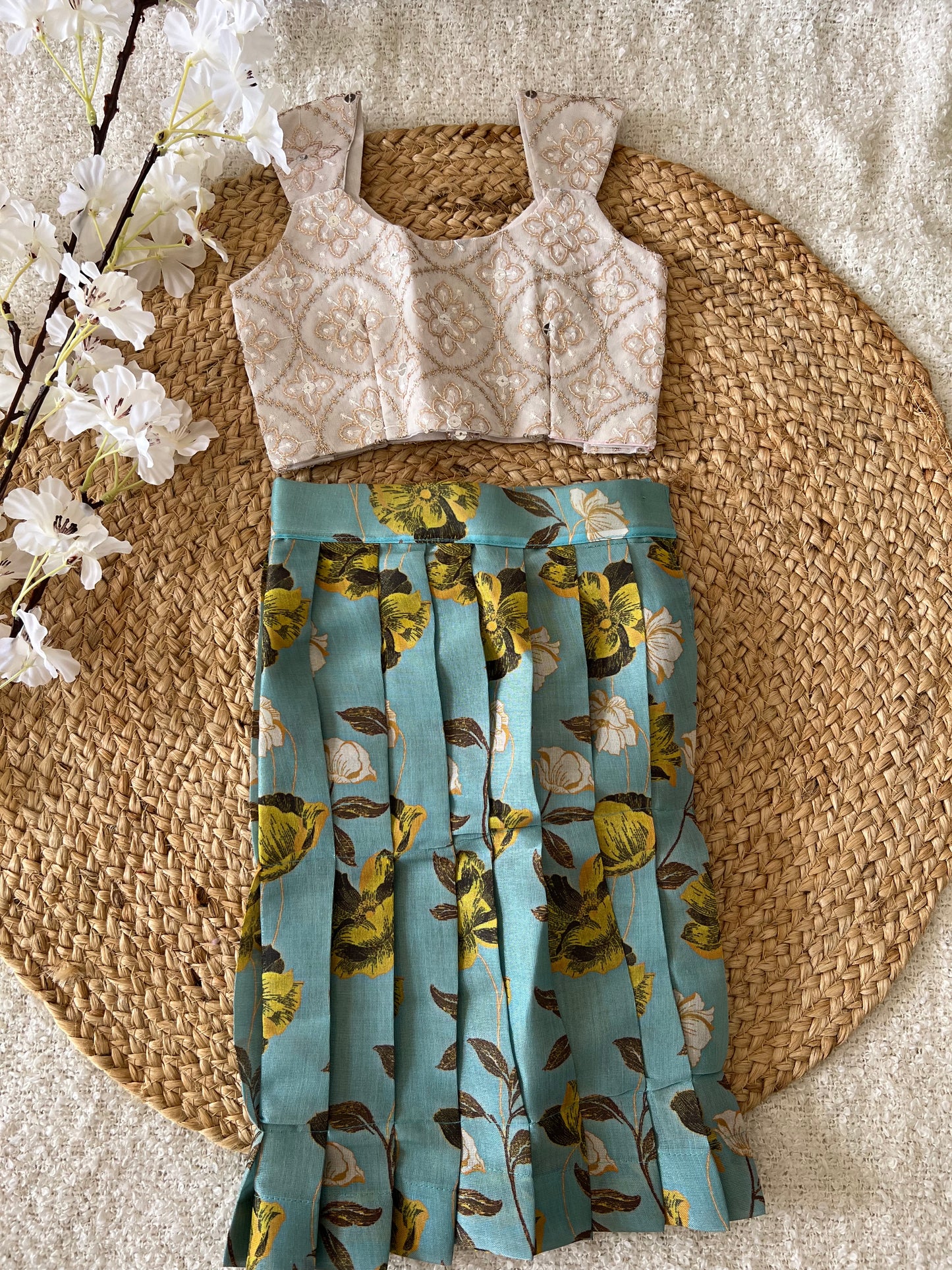 White top and blue skirt