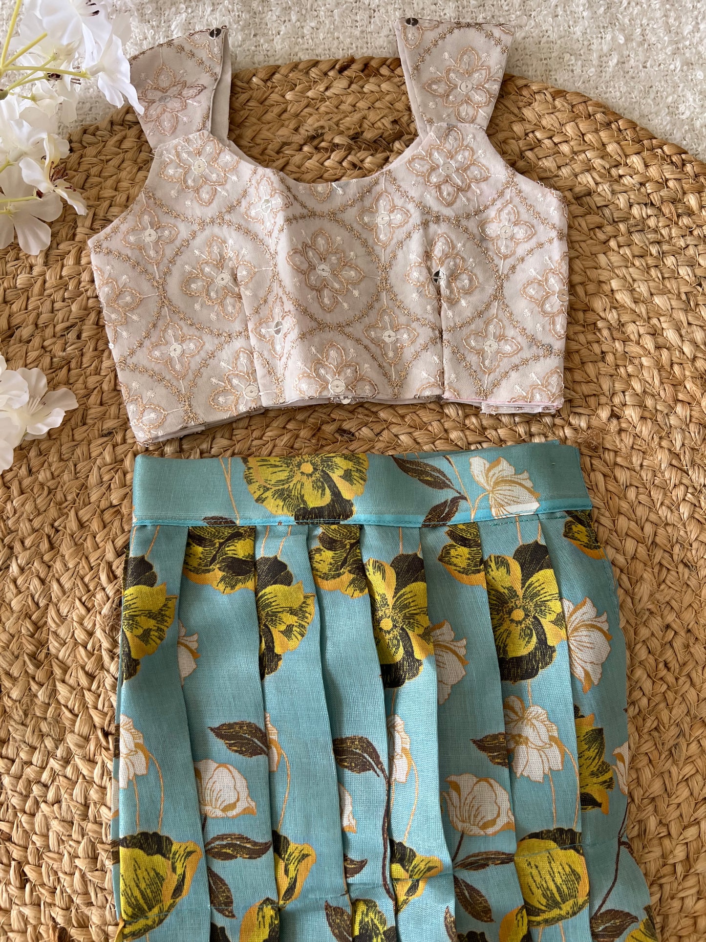 White top and blue skirt