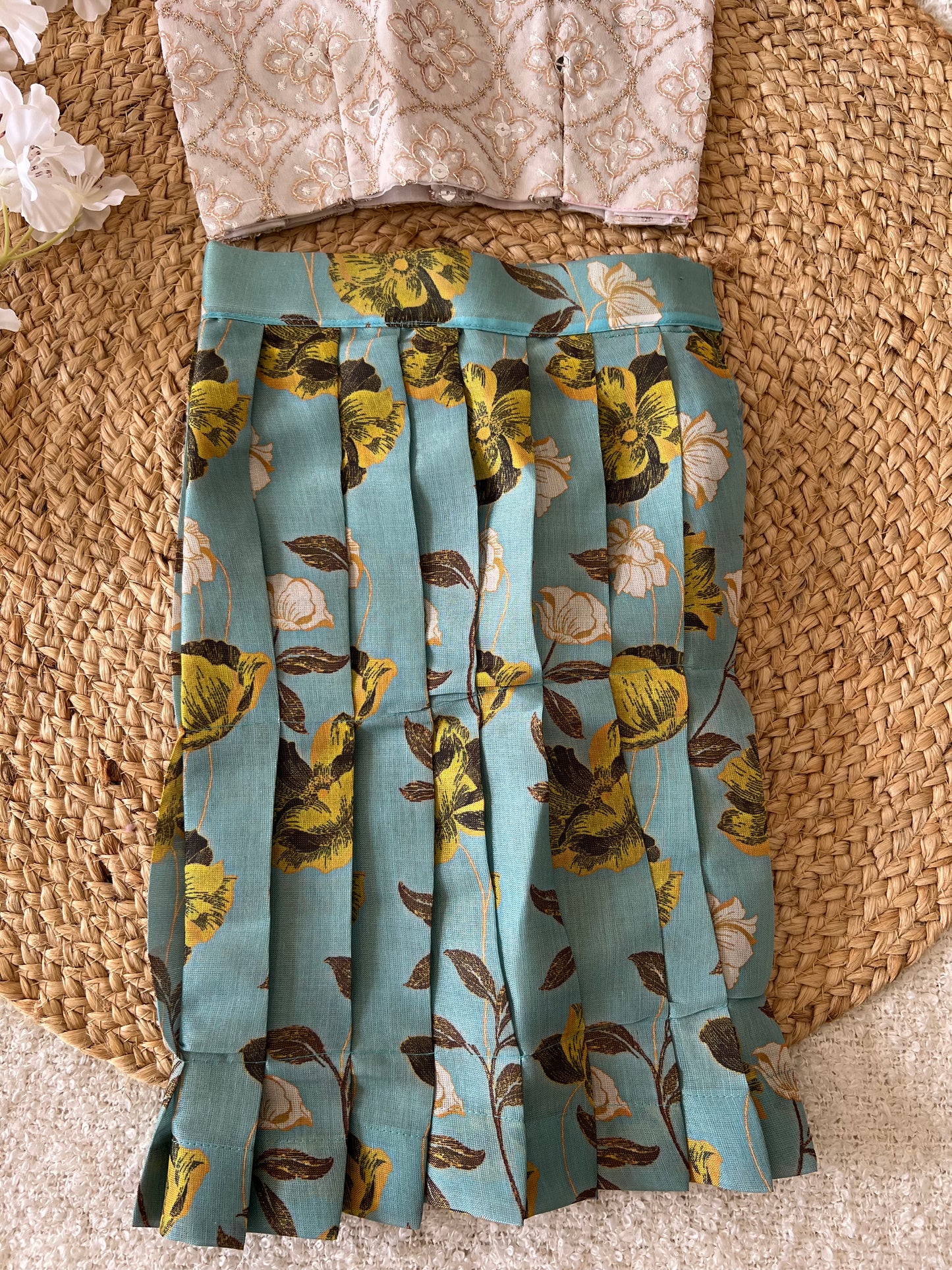 White top and blue skirt