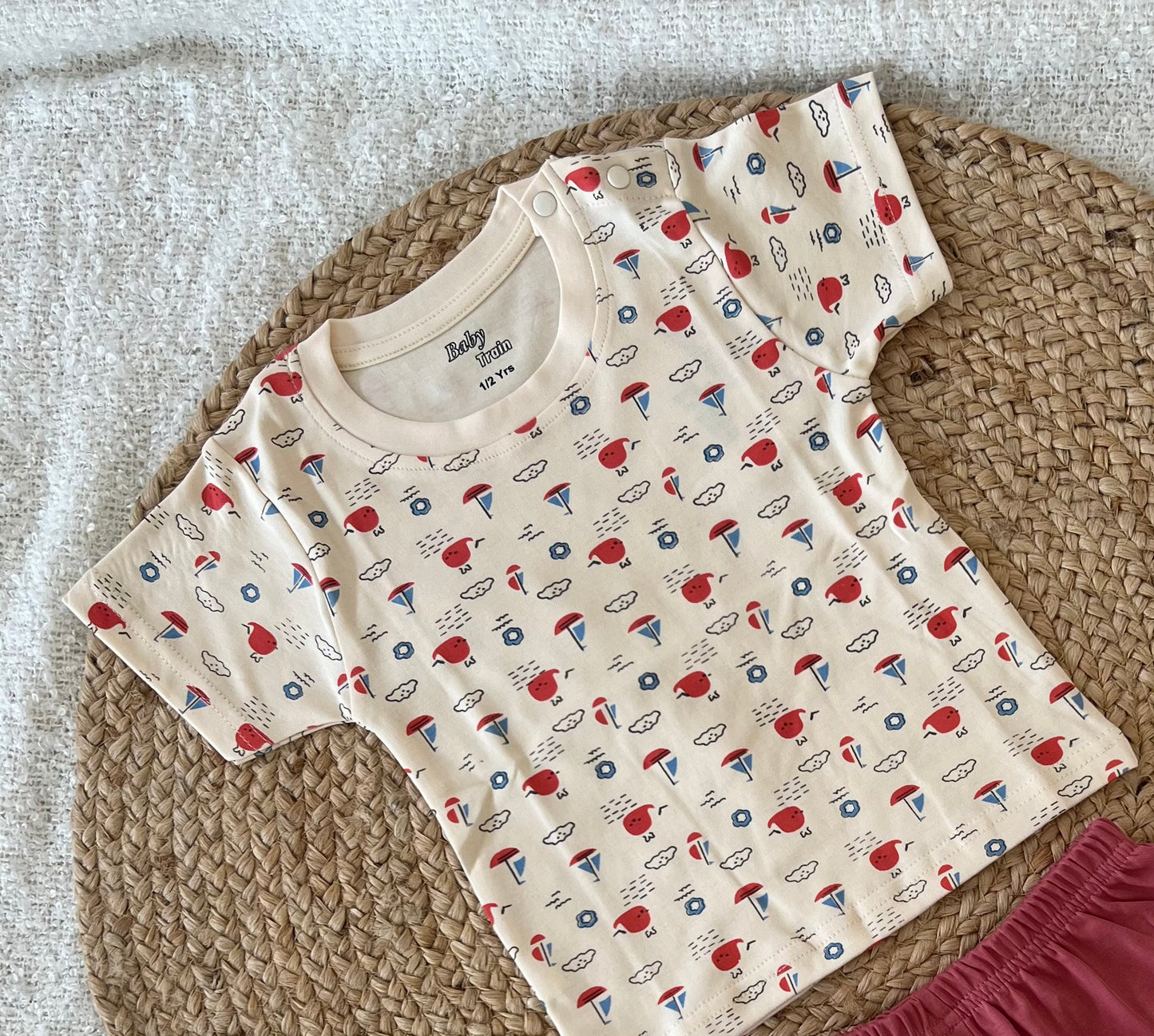 Beige T-shirt and red bottoms