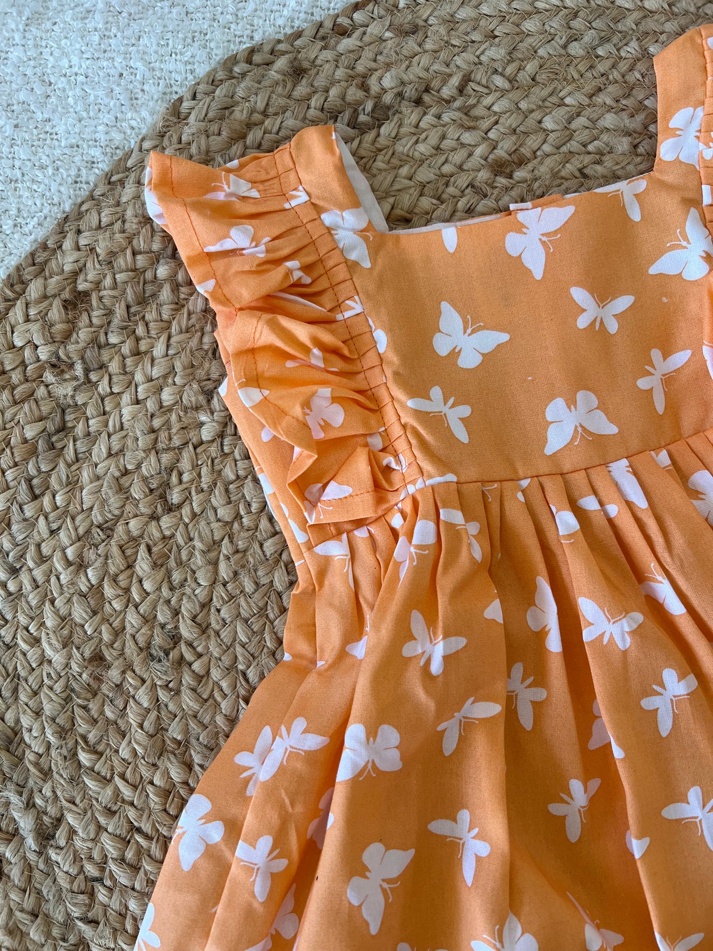 Orange butterfly frock