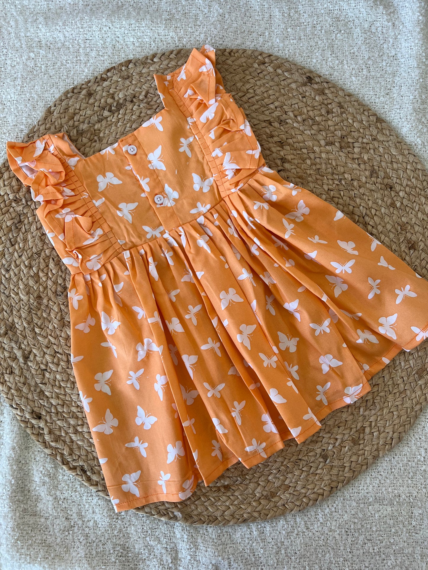 Orange butterfly frock